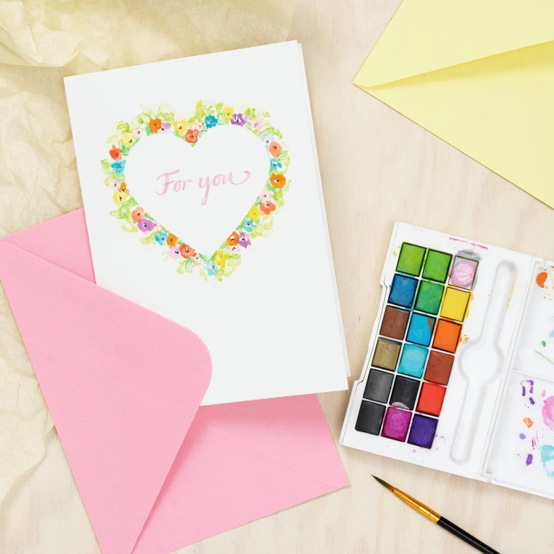 een valentijnskaartje met aquarelverf
